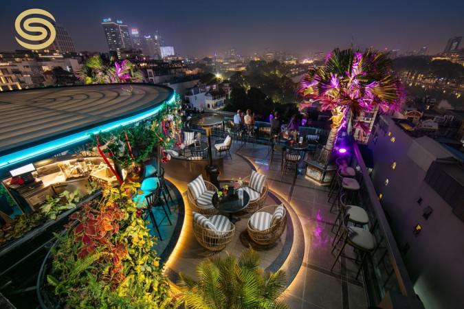 Relax with a cocktail at san rooftop bar in the evening